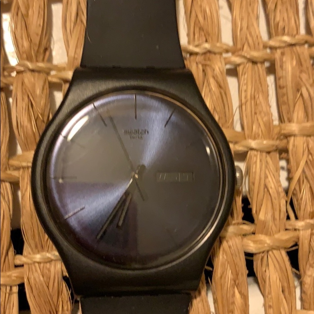 Swatch watch black on black . Silicone band